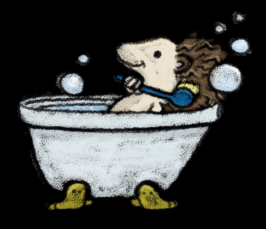 Igelkott som badar i ett badkar